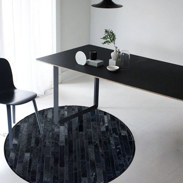 ALECTO Modern Round Cowhide Leather Rug