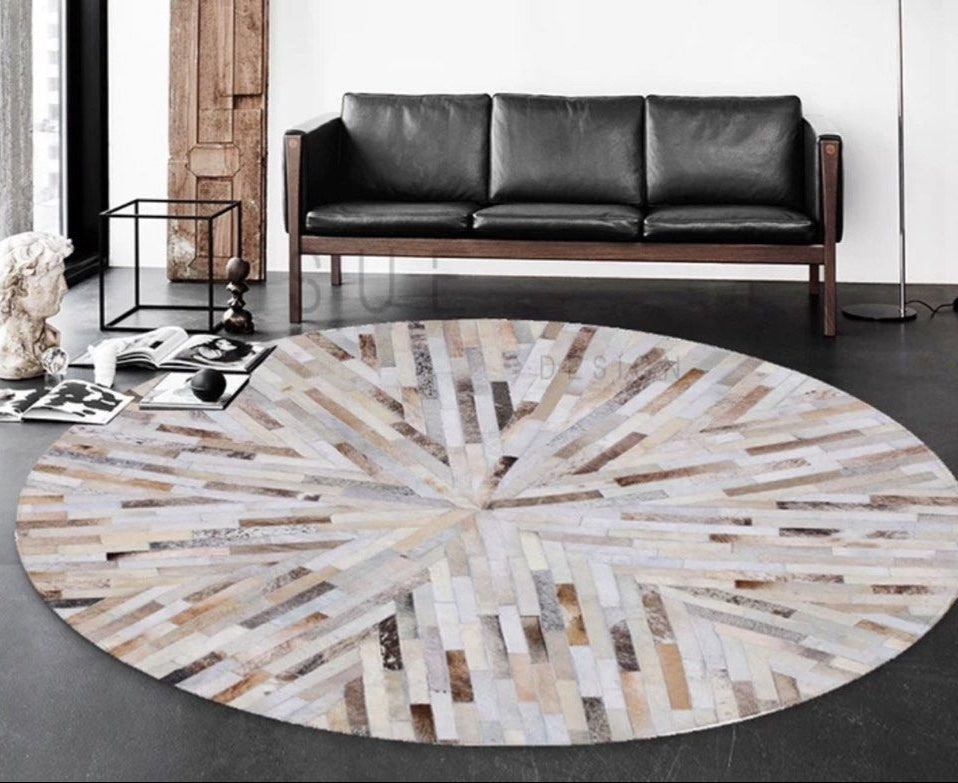 ALECTO Modern Round Cowhide Leather Rug